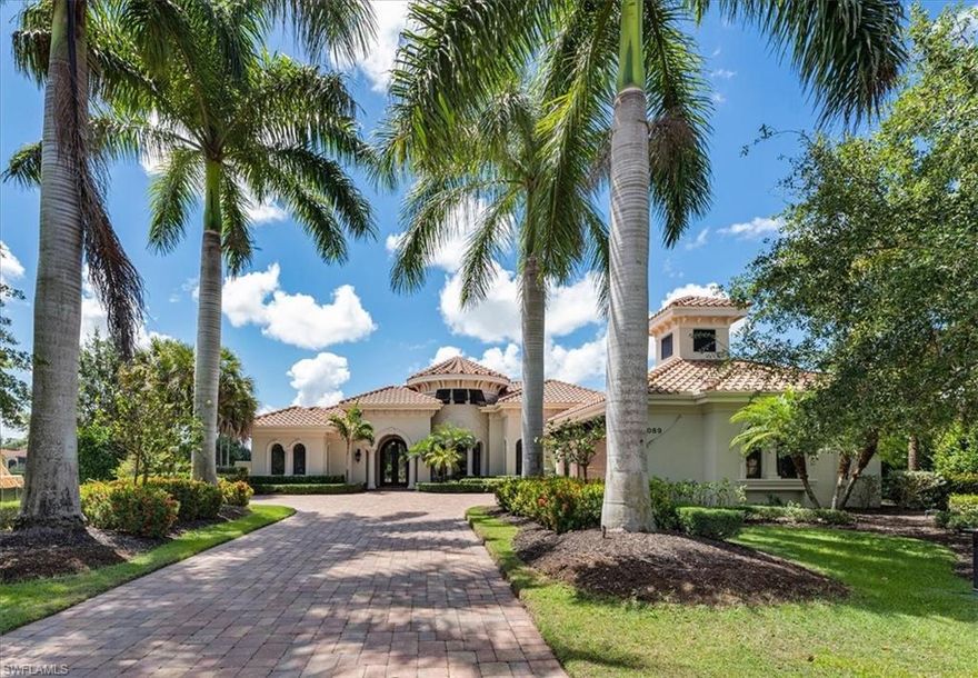 H6263- Cross the threshold of this remarkable home to see the perfect triad of open floor plan, stunning views and attention to detail. This quintessential Florida home on a huge lot w tons of green space is designed by Soco Interiors and features architecturally detailed ceilings, custom built-ins, plantation shutters & more. New in 2021, a custom-built bonus room by Imperial Homes opens to a covered lanai & the kitchen/family room & features a well-equipped wet bar w two wine refrigerators, indoor/outdoor entertaining possibilities and a cheery place to gather. Enjoy a study w desk & sidebar w custom cabinetry & wine fridge, formal dining room w rotunda ceiling and a gourmet kitchen with walk-in pantry, huge island & large breakfast area. The split floor plan offers privacy & master bedroom in separate wing features hardwood flooring & custom closets. The south facing lanai with wood-paneled ceilings offers a sparkling lake view w a touch of golf. Multiple seating areas on & around include two fire pit areas & an infinity edge water feature w fire bowl. LED landscape lighting, security cameras & inside/outside speakers.  Transferable golf membership with assessment paid is available.