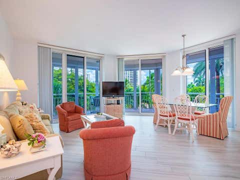 Photo of 4255 Gulf Shore BLVD N #107, NAPLES, FL 34103 (MLS # 226029129)
