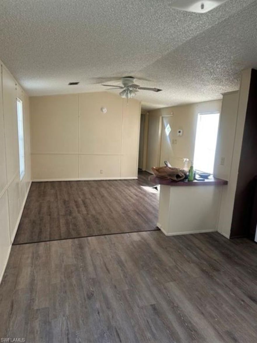 Charming single-family 2 bedroom, 2 bathroom mobile home in Moore Haven. This residence has plenty of front yard space and the interior includes a split bedroom floor plan with open kitchen-living concept. Call us today for a tour.