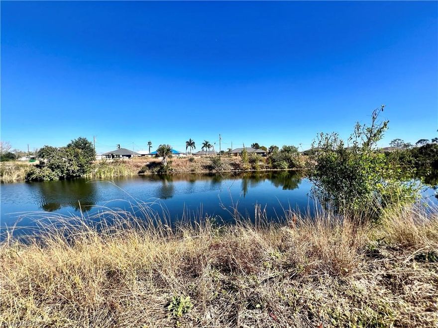 Beautiful lot located on a wide canal in a well developed beautiful Cape Coral area close to shopping, beaches fine dining and entertainment . Gopher tortoise nests on property.