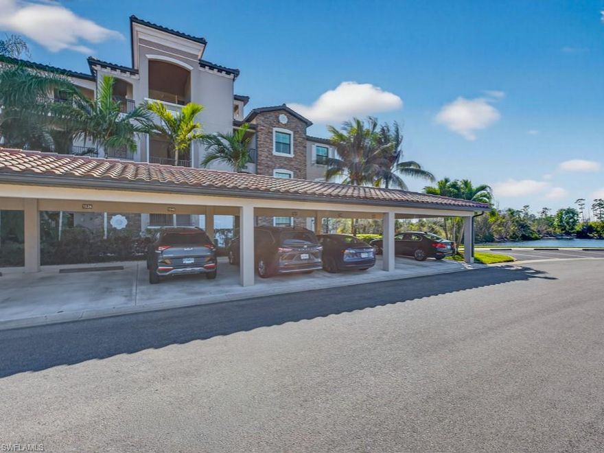 FULL TPC GOLF MEMBERSHIP awaits your Giaveno golf condo nestled in the desirable Treviso Bay neighborhood in Naples just minutes from downtown and the beautiful peaceful beaches of Marco island! Enjoy this beautifully turnkey appointed two bedroom, two bath Bellini floor plan condo with a peaceful water view.  The bright foyer welcomes you with crown molding, diagonal tile flooring with upgraded carpet in the bedrooms. The spacious primary bedroom offers two closets, ensuite bath with walk in shower. Your guests can relax in their private bedroom with an adjacent bath. The gourmet turnkey kitchen is equipped with stainless steel appliances, kitchen nook with a desk and pantry. Feel protected from the elements as this condo has hurricane impact glass and doors. Relax on the peaceful lanai privately over looking all the abundant nature of the Rookery Bay preserve and water views!! There is an extra added storage unit for your golf clubs, bikes and beach chairs! The Giaveno neighborhood pool and grill area is located just minutes from this condo. This condo comes with a TRANSFERABLE TPC GOLF MEMBERSHIP to enjoy! This entitles you to play the many TPC designated golf courses around the United States! Treviso Bay's Five Star amenities are second to none boasting the Villa Rilassare amenity center La Bressa resort style pool and bar, professionally staffed fitness center, tennis courts, bocce, pickle ball, basketball and full spa services. The spectacular Treviso Bay TPC Golf clubhouse has two dining rooms, library, TPC pro shop, luxurious locker rooms and a breathtaking terrace over looking hole 9 and 18 to enjoy cocktails or fine dining. Just 5 miles away from Naples beautiful sandy beaches and fabulous 5th Ave shopping and restaurants.