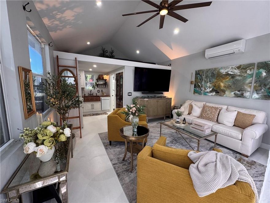 Lot 201 welcomes you with a quiet sense of joie de vivre, where pride of ownership is immediately felt. The coach house is adorned with Provincial-inspired French doors that set a gracious, welcoming tone evoking the charm of a European retreat and inviting you into a space designed for calm, curated living. Inside, the elevated interior unfolds as a restorative sanctuary, thoughtfully composed to inspire ease, balance, and understated sophistication. The open living area embraces low-stress, bespoke comfort, creating an atmosphere where life gently slows and everyday moments feel intentionally refined. Elegant furnishings elevate the open-concept design, offering inspiration for luxury living at every glance. The kitchen captures a delightful French country flair, from the charming white Bon Appétit refrigerator detail to the deep copper apron-front sink and thoughtfully set-in pantry—an inviting space that inspires even the most modest chef. Each element feels warm, welcoming, and effortlessly stylish. The bath offers a spa-like retreat with a tailored, almost atelier-style finish that is inviting, calming, and intentionally indulgent without excess. Above, a loft provides discreet additional storage and flexible guest sleeping space, preserving the uncluttered elegance of the main living areas and ensuring the coach house remains serene and composed. Every element of the interior speaks to comfort with intention, a space where simplicity feels luxurious and each day begins and ends in quiet sophistication. Outdoors, the property enjoys a coveted north-facing orientation, just a short stroll from the heart of RiverBend. Spend endless afternoons lounging poolside with tropical cocktails, or retreat to the back lanai, where freshly sealed pavers lend a polished finish to this cozy haven, beckoning you morning, noon, and night. Evenings invite unforgettable stargazing with friends and family beneath wide, open skies. Further enhancing the allure of the lot, RiverBend Motorcoach Resort offers a lifestyle defined by sophistication, connection, and effortless enjoyment. Set along the picturesque Caloosahatchee River, gentle breezes move through moss-draped oaks as tranquil water views invite you to slow down and savor the moment. At the heart of the community, the River Clubhouse comes alive with music nights, elegant dinners, lively trivia, and gatherings where neighbors quickly become friends. The Creations Clubhouse offers a welcoming retreat for artistic expression. Sun-filled days unfold beside the expansive pool and cabana bar, infused with a fun-loving spirit that makes every day feel like a getaway. Mornings begin with fitness classes, pickleball, or leisurely walks, while afternoons drift by on golf-cart cruises or relaxed poolside lounging. As evening settles in with glowing sunsets and shared laughter, it becomes clear, RiverBend is truly exceptional, a place where beauty, community, and connection make leaving feel nearly impossible.