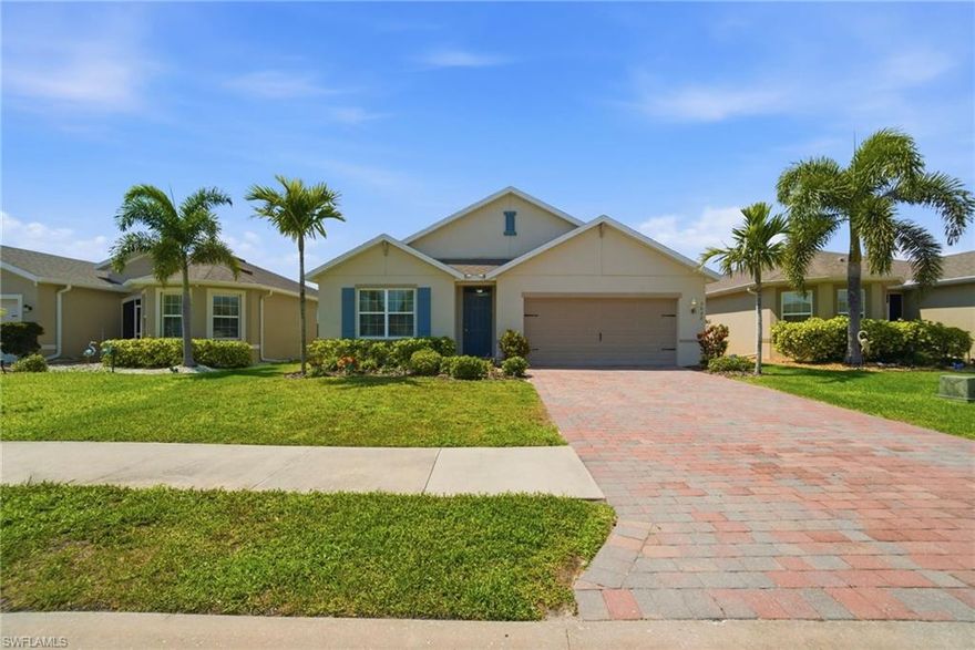 Set on a premium homesite with a wide, uninterrupted long lake view, this residence captures one of the most desirable vantage points in Cape Coral’s Entrada community—where water, sky, and sunsets become part of your everyday backdrop. Perfectly positioned within the neighborhood for both privacy and convenience, the location offers easy access in and out while still feeling tucked away.

Inside, the home is designed to highlight that view, with a light-filled, open layout that draws your eye straight through the main living spaces to the water beyond. The kitchen anchors the home with clean, modern finishes, generous cabinetry, and a functional breakfast bar—ideal for casual mornings or hosting with ease.

The primary suite is a quiet escape, thoughtfully oriented to take full advantage of the lake, and complemented by a spacious walk-in closet and a well-appointed ensuite bath. Three additional bedrooms offer flexibility for guests, a home office, or growing needs without sacrificing comfort. And for added peace of mind, the home is equipped with hurricane shutters.

Living in Entrada means enjoying a well-located Cape Coral address paired with exceptional value—offering resort-style amenities including a pool, clubhouse, fitness center, tennis, pickleball, and more, all with notably low HOA fees.

This is a property where the view and location do the talking—a rare combination that elevates everyday living.