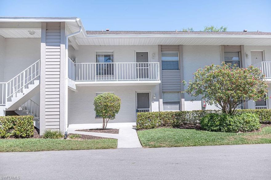 Charming Condo in the Heart of Naples.   First floor living in this light and bright 2 bedroom/2 bath unit.  It features an open-concept dining and living space, and beautifully renovated and updated kitchen.  All new LG  refrigerator, dishwasher, range and microwave were added in February 2025.  The kitchen features granite countertop, double stainless sink, paneled cabinets and a cozy breakfast nook.   Freshly painted throughout, the newly updated panel doors add a touch of elegance.  The primary suite features a spacious walk-in California-style closet with ample storage and an ensuite with spacious walk-in shower and full sliding glass door.  The condo features a large laundry room with updated washer and dryer (2023) and overhead cabinet storage. The HVAC and hot water heater were both replaced in December 2024.  Step outside through sliding glass doors off the living room to enjoy your morning coffee or read a book on your private screened lanai, offering a tranquil view of a quiet landscaped area.  Canterbury Village offers reasonable HOA fees which include building insurance, lawn maintenance, water, cable/internet and the convenience of an assigned parking space next to your building, with numerous guest parking spaces.  The complex buildings have been recently painted (2023) with new roof installation in August 2018.  Located in the peaceful Berkshire Village community, you have access to fantastic amenities that include two community pools, tennis, pickle ball courts and a fishing pier.  The community is within walking distance to Berkshire Commons Plaza.  It is directly across the street (Santa Barbara Blvd) from the Golden Gate Community Park, which features bike paths, a playground, Aquatic Complex and Fitness Center with low yearly rates (reduced for Collier County employees).  Centrally located to shopping and I-75, approximately 7 miles to Downtown Naples, 5th Avenue District and the beautiful sandy beaches of the Gulf!  This condo is move-in ready!  A must see, schedule your showing today!!