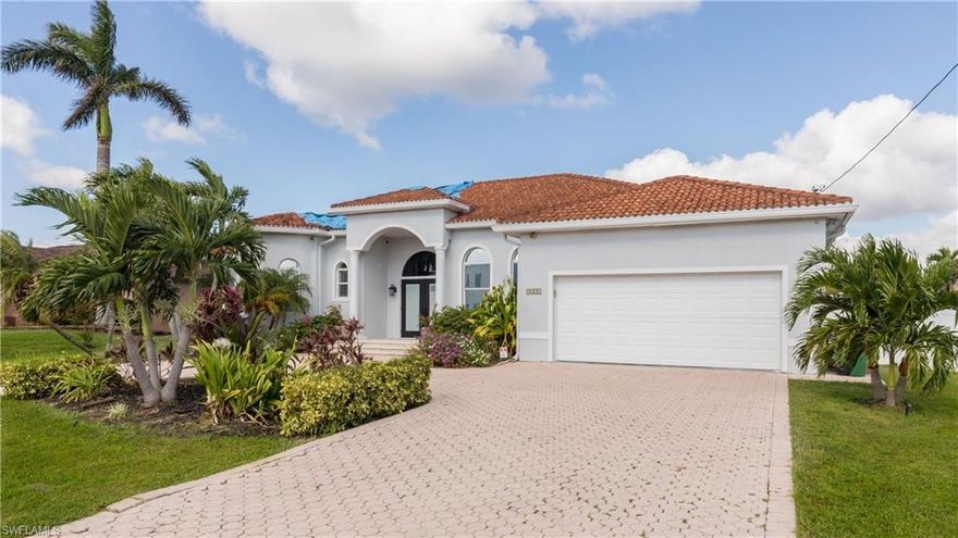 Stunning home for a stunning price! Located in the upscale Surfside area of Cape Coral offers over 2,500 square feet of beautifully designed living space. Featuring three spacious bedrooms, a den, and a versatile flex room, this home provides ample room for both relaxation and entertainment. With 2 1/2 bathrooms, it offers convenience and luxury at every turn. The heart of the home is its recently remodeled kitchen, showcasing sleek quartz countertops, stainless steel appliances, and an open layout that seamlessly flows into the expansive living area. The high-end finishes continue throughout, with elegant travertine tile flooring that runs throughout the entire home, adding to its sophisticated appeal. Whether you’re hosting guests or enjoying quiet family time, this property offers a perfect blend of style and functionality. Its modern updates, spacious rooms, and prime location in the desirable Surfside area make it an ideal place to call home. Priced competitively, this is an exceptional opportunity to own a beautifully appointed, move-in-ready home in one of Cape Coral’s most coveted neighborhoods. Please note, the home has experienced roof damage, and the price has been adjusted to reflect this repair consideration.