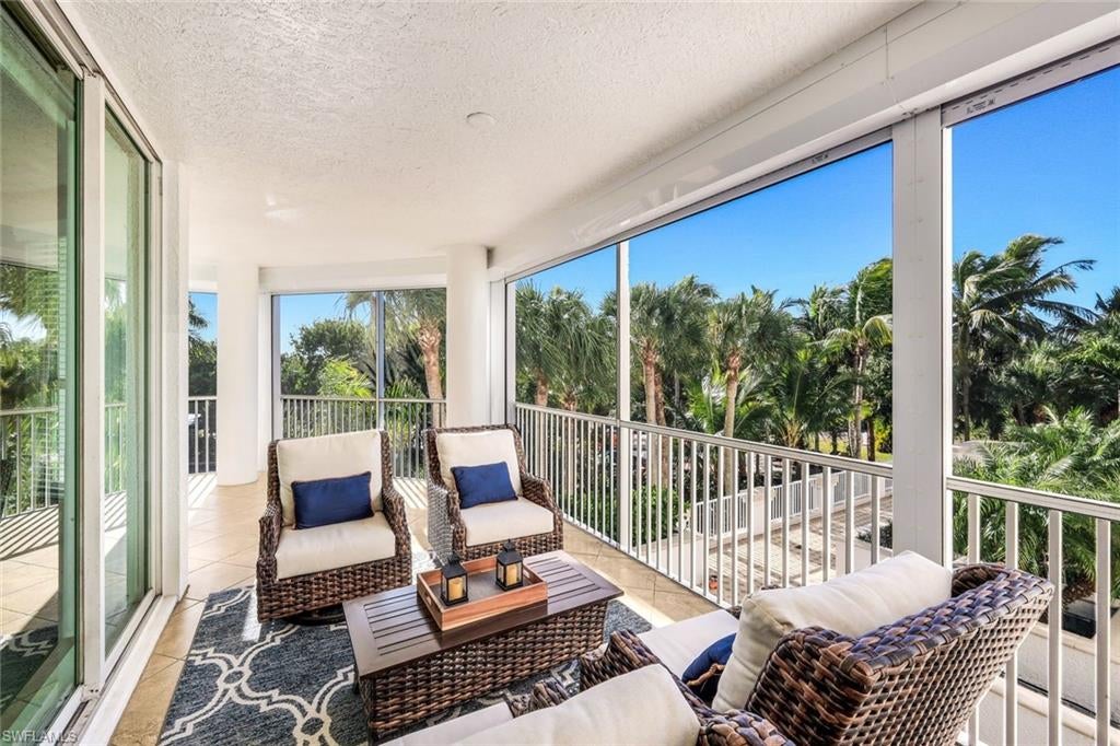 Photo of 300 Dunes BLVD #201, NAPLES, FL 34110 (MLS # 226002873)