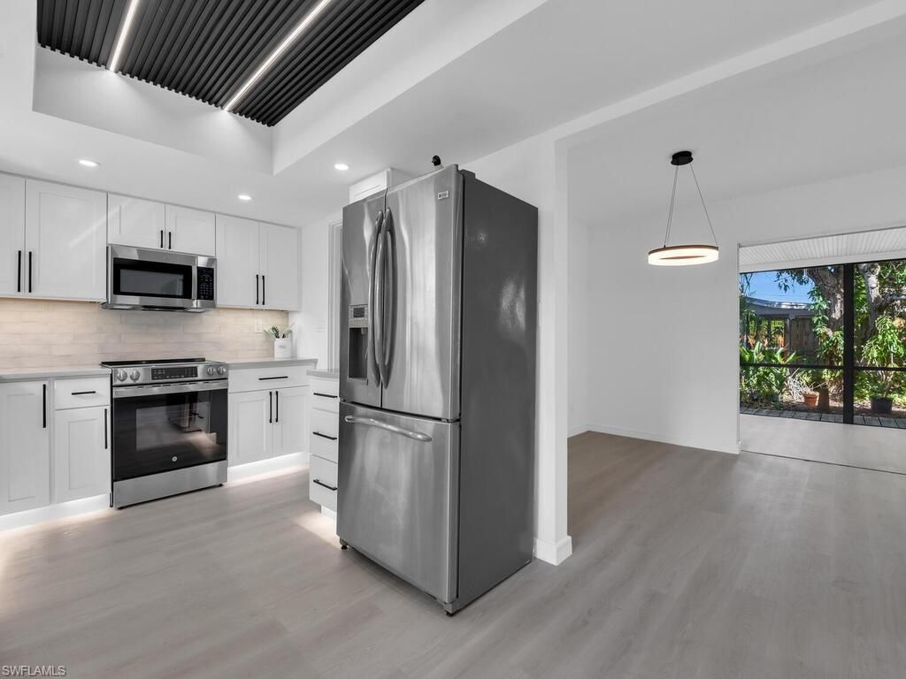 Photo of 4941 Aztec CIR, NAPLES, FL 34112 (MLS # 226010041)