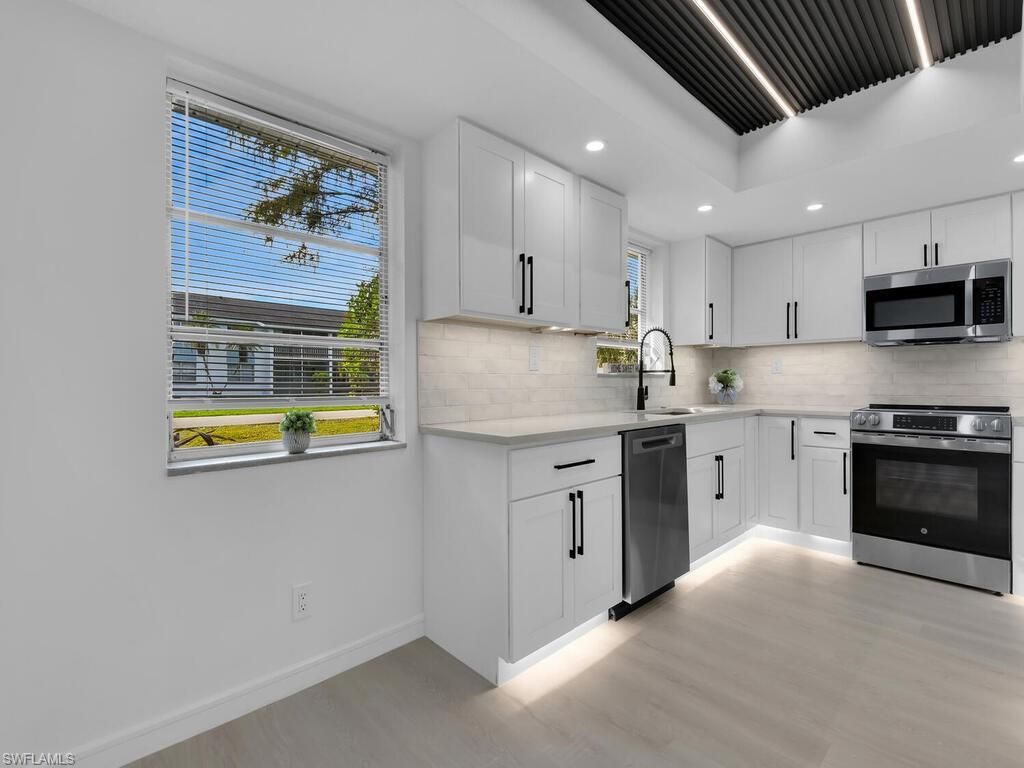 Photo of 4941 Aztec CIR, NAPLES, FL 34112 (MLS # 226010041)