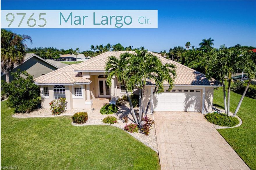 MAGNIFICENCE ON MAR LARGO!! Fall in love with this magnificent, airy, high quality, estate home boasting soaring ceilings, wide open spaces, disappearing corner pocket sliders, sparkling pool and lovely lake view all set on the ideal, oversized premium lot in the desirable estate section of Venetian Village! As you walk up you will notice this homes amazing curb appeal, tropical landscape and tall inviting entry way. Select features include, pocketing and corner glass sliders creating a wonderful combination of indoor and outdoor living, tile in all main living areas, split bedroom floor plan, huge covered lanai, spacious outdoor pool deck, large sparkling swimming pool with waterfall feature backdropped by view of the lake, open kitchen with raised bar and much more! Venetian Village is a fabulous, low fee, gated community perfectly located near popular white sand beaches, restaurants, shopping, dining, Sanibel and Captiva Island and all that sunny SW Florida has to offer! Call for your private showing today!