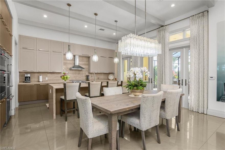 Welcome to your new paradise home, where luxury, comfort, and the Southwest Florida lifestyle come together in perfect harmony. Ideally located a block away from the clubhouse and amenities center, this exceptional residence offers the rare combination of elegant design, thoughtful upgrades, and unbeatable convenience within one of Naples’ most sought-after resort-style communities.

From the moment you step inside, you are greeted by a light-filled, sophisticated interior that exudes a sense of refined coastal luxury. The heart of the home is the custom-designed kitchen, featuring beautifully crafted cabinetry, an oversized island ideal for entertaining, a walk-in pantry, wine cooler, and exquisite designer lighting that flows seamlessly into the dining area. Every detail has been carefully curated to create both functionality and style, making this space as practical as it is stunning.

The spacious primary suite is a true retreat, complete with private glass doors leading to the lanai, custom window treatments, and a spa-inspired bathroom featuring a soaking tub, elegant finishes, and a generous walk-in closet designed for optimal organization. Two guest bedrooms are perfectly positioned with a Jack and Jill full bathroom, offering comfort and privacy for family or visitors. A versatile flex room, currently configured as an additional bedroom with frosted glass French doors, includes a nearby half bath and provides endless possibilities to suit your lifestyle. In addition, a dedicated office creates the perfect space for working from home or managing daily life with ease.

Step outside to your private outdoor oasis, where an oversized screened lanai invites you to fully embrace the Naples lifestyle. This exceptional space features a fully equipped outdoor kitchen, and expansive covered seating areas with additional sun-drenched lounging space. The large custom pool with integrated spa, fire wall feature, and lush decorative landscaping with grass accents create a resort-like setting that is both tranquil and ideal for entertaining.

A spacious two-car garage completes the home, providing ample storage and convenience.

Naples Reserve is renowned for its vibrant, resort-style living centered around a stunning 125-acre lake. Residents enjoy a world-class amenities center featuring a clubhouse, resort-style pool, lap lanes, fitness center, classes, tennis, pickleball, bocce, volleyball, and miles of scenic walking/biking paths. Unique to Naples Reserve, the community also offers kayaking, paddleboarding, a private island with Tiki hut, beach area, fire pit, kids cove park, and a dog park. The onsite cafe is perfect for casual dining and social gatherings, while a full calendar of events creates an active and engaging lifestyle.  The new outdoor bar/restaurant is almost complete! 

This is more than just a home—it is an opportunity to live like others vacation, surrounded by luxury, nature, and an unmatched sense of community.