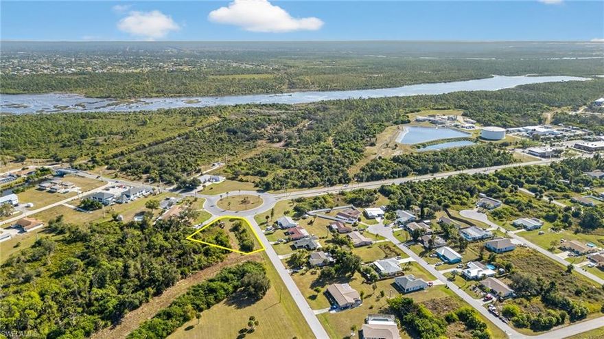 Build your dream Florida home on this oversized corner lot located in the desirable Rotonda Shores community. Positioned within a charming roundabout, this spacious homesite offers added privacy and flexibility for a custom build. Enjoy a true Southwest Florida lifestyle with multiple golf courses just a short golf cart ride away, plus easy access to restaurants, shopping, marinas, fishing, and everyday conveniences. Some of the area’s most popular beaches—including Boca Grande and Englewood Beach—are just 15-20  minutes away, offering boating, sunsets, and sugar-sand shores. Conveniently located near Port Charlotte Town Center and approximately 40 minutes to I-75, this property is ideal for a primary residence, vacation home, or investment opportunity. Oversized lots this close to beaches and golf are limited—don’t miss your chance to secure this prime Rotonda Shores location. (Lot lines shown are approximate and for illustrative purposes only and may include easements. County records and images provided for reference. Buyers to verify all information independently.)
