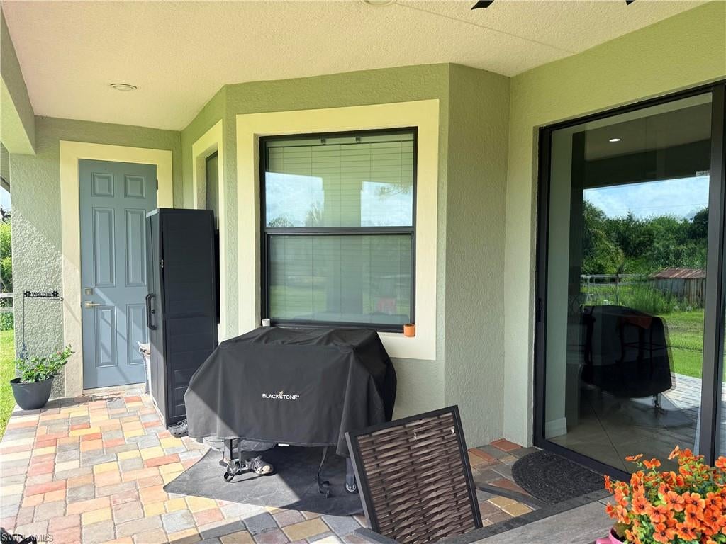Photo of 1210 Plumosa AVE, LEHIGH ACRES, FL 33972 (MLS # 226027775)