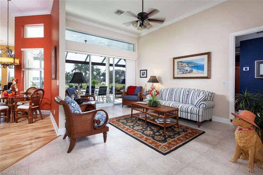 Gorgeous 3 bedroom plus den, 3 bath home offers a spacious open floor plan, abundant natural light, and soaring ceilings. Large kitchen with ample storage boasts new stainless steel appliances and quartz counters and sink. The lanai overlooking Smokehouse Waterway boasts picture window screens, large pool, and new hot tub in addition to plenty of space for al fresco entertaining. This is an ideal location for the fishing or boating enthusiast with quick, direct Gulf access. New, professionally designed landscaping enhances the curb appeal of this stunning home and includes citrus trees - enjoy lemons, limes, and grapefruits from your own backyard. New boat is also for sale, see remarks for additional information.