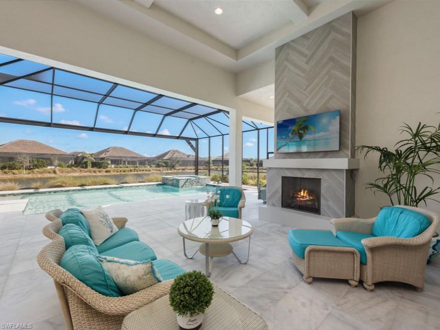 Idyllic rare oversized lot with no shortage of luxury in this Marigold floor plan. Boasting 3578 Sq.Ft. of living space coupled with expansive outdoor living, perfect for entertaining. The elegant interior is bathed in natural light featuring a great room, adjacent gourmet kitchen, formal dining, bonus room and private study. The open-concept kitchen is a Chef’s dream with gas cooking, white cabinetry and large center island with plenty of seating. Relax at the end of the day in your serene private suite overlooking the pool and spa. The outdoor kitchen, sitting and dining area, gorgeous marble tiled lanai, complete with outdoor fireplace is truly an oasis of peace and relaxation. Custom upgrades include European white oak flooring throughout, Circa lighting, coffered ceilings, custom window treatments and more. Ideally located in desirable Isles of Collier Preserve, favored for its close proximity to 5th Avenue and beaches and their outstanding amenities, including two pools, pickleball, tennis, kayaking, miles of trails, fitness center & The Overlook Bar and Grill. Offers a 3-Car Garage and salt water pool. Gently lived in.  Be prepared for 'love at first sight'.