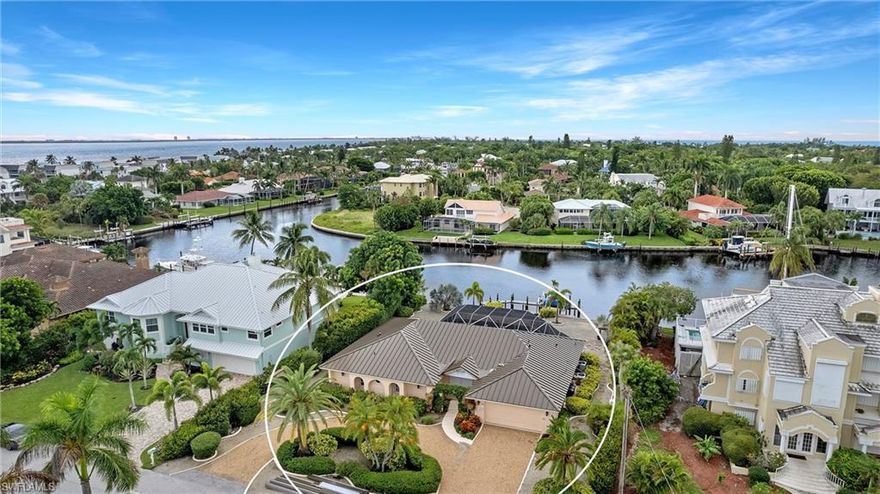 Situated on one of the most desirable lots on one of the most sought-after streets in Shell Harbor, this home has unrivaled water views overlooking one of the widest boating basins on all of Sanibel, offering some of the deepest direct-access dockages the islands have to offer. The large backyard leads to the new dock with captains' walk, boatlift, seating area and composite decking. Pricing reflects complete interior and exterior renovation to be completed in June 2022. Exterior: new standing seam metal roof, including hurricane straps, reconfigured openings for new hurricane-rated windows/doors, stucco texture to resemble Hardie plank, modern coastal exterior elevation with French doors opening to porches, blending the outdoors with the indoors. Interior: reconfigured floor plan with chef's kitchen, Thermador appliances, fireplace, on-trend lighting, butler bar, tasteful coastal-contemporary baths and engineered wood flooring throughout, including $100k-plus in new decorator furnishings, shown in video rendering.