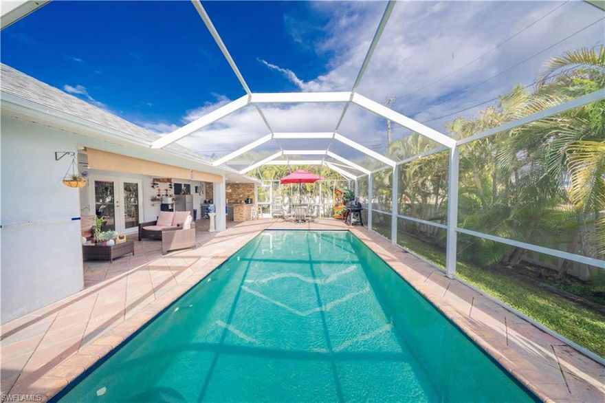 Located in Cape Coral, this impressive corner lot home, built in 2005, features fresh upgrades. Sitting on half an acre, it boasts a 2023 roof, 2023 AC, and a 2023 fence with a 22-foot remote-controlled gate. The screened lanai was updated in 2023, and the home offers a 2015 pool (25x12) with a 2015 heater. Inside, the home is fully remodeled with modern LED lighting, a fireplace, a completely renovated kitchen and bathrooms with smart toilets, and tile flooring throughout. The property is delivered with kitchen appliances except the dishwasher, as well as a washer and dryer. It has a security system with cameras and alarms connected to fire and police services. There’s also a 2019 shed (10x16), a 2022 summer kitchen, and a 2026 sprinkler system. The garage includes a mother-in-law suite ideal for rental income.