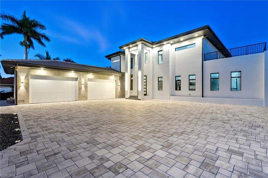 A Rare Waterfront Gem in North Fort Myers!

Tucked away in the exclusive River Club community, this brand-new 2024 estate captures the essence of Southwest Florida living with direct water views, a southeastern exposure, and a design crafted by a renowned German builder known for precision and quality.

This two-story residence welcomes you with a bright, open floor plan that flows seamlessly to the outdoors, where walls of glass frame the river and bring in both spectacular sunrise and glowing sunset views. With an oversized four-car garage — complete with a car lift for additional parking — this home blends everyday functionality with luxurious details throughout.

This home encompasses a total area of 8,582 sq. ft., complemented by a spacious 4-car garage, inviting entry, covered lanai, and expansive balcony, as measured by building plans.

Set on an oversized lot, the property offers exceptional outdoor living. A custom infinity-edge pool and spa with sun shelf and spillovers create a resort-like ambiance, all enclosed for year-round comfort. Two expansive roof terraces provide the perfect vantage point for cocktails at sunset or morning coffee overlooking the water.

For boating enthusiasts, the home is fully equipped with a 14,000-lb boat lift capable of handling vessels up to 30 feet and a 7,000-lb jet ski platform, making waterfront adventures effortless. Importantly, the property remained completely dry during recent storms, offering peace of mind along with its beauty.

Every aspect of this residence reflects thoughtful design, from its open, light-filled interiors to its elevated outdoor spaces. With craftsmanship you can feel and a lifestyle you’ll cherish, 6390 River Club Court is more than a home — it’s a true statement in modern Florida waterfront living.