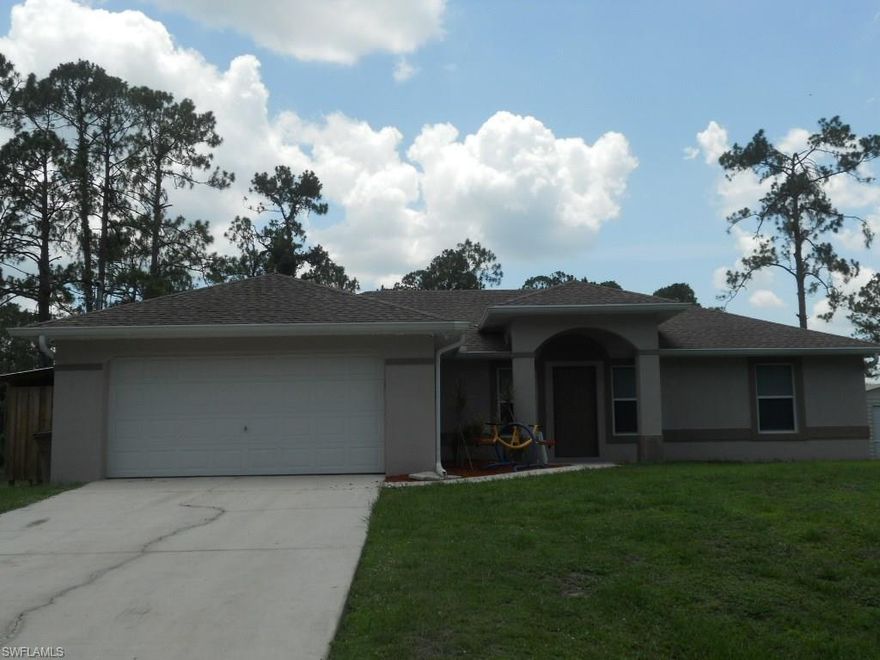 This single family home is 1519 sf under air with 3 bedrooms and 2 baths and is situated on .24 acres.  Great open floor plan with high ceiling in the living room, kitchen and dining areas.  Screened lanai off of the Kitchen and Living room.  Nice and quiet street with only one neighbor next door.  With a little TLC, this can be a great home.