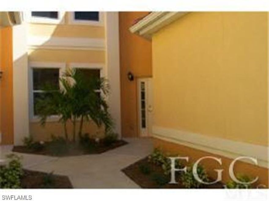 UPGRADES GALORE IN THIS GROUND FLOOR RETREAT! GREAT ROOM DESIGN WITH HIGH CEILINGS, ARCHWAYS & PLANT NICHES = GRACIOUS LIFESTYLE. 16 TILE ON THE DIAGONAL THROUGHOUT THE LIVING AREA--EVEN ONTO THE LARGE LANAI OVERLOOKING THE LAKE. STAINED CABINETRY, GRANITE COUNTERTOPS, TILED BACKSPLASH, PANTRY & UPGRADED APPLIANCES ENHANCE THE QUALITY OF THIS HOME. EASY ENTRY THROUGH THE TWO CAR ATTACHED GARAGE-- NO STAIRS! GATED, NATURE TRAIL, LIGHTED TENNIS COURTS, HEATED POOL AND SPA & COMMUNITY CLUB HOUSE WITH EXERCISE ROOM, BILLIARDS, LIBRARY & PARTY ROOM WITH KITCHEN. GREAT LOCATION CONVENIENT TO BEACHES, SHOPPING, RESTAURANTS, LIBRARY & HEALTH PARK.