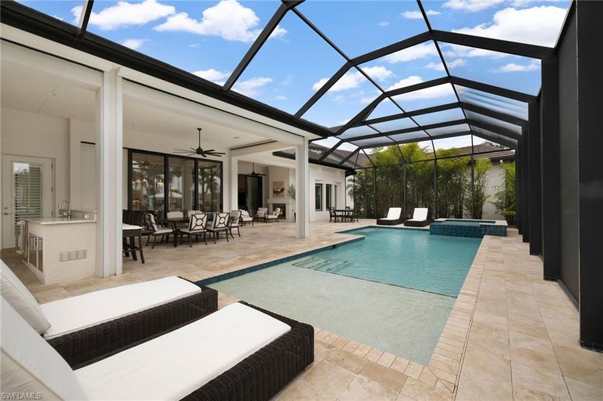 Welcome to this exquisite waterfront residence nestled within the prestigious Miromar Lakes Beach & Golf Club. This luxurious three-bedroom, three-and-a-half-bathroom home offers unparalleled elegance and comfort. Upon entering, you are greeted by an open floor plan bathed in natural light from the southeast exposure. The interior boasts custom décor in tranquil palettes, featuring a wine room, wet bar, and both indoor and outdoor kitchens, seamlessly blending to create an exceptional space for entertaining. The screened-in pool, outdoor fireplace, and expansive circular driveway enhance the home's allure. Situated on a private beach, this residence offers enchanting views of the serene lake, providing a tranquil retreat. Residents of Miromar Lakes enjoy a five-star resort lifestyle with world-class amenities, including over 700 acres of freshwater lakes for boating, water skiing, and kayaking, as well as three miles of private white-sand beaches. The Beach Clubhouse offers gourmet and casual dining, a wine room, and a library, while the Blue Water Beach Grill provides open-air lakeside dining. A full-service European-style spa and fitness center features private treatment rooms, a state-of-the-art gym, and personal training services. Sports enthusiasts can enjoy Har-Tru tennis courts, bocce, pickleball, and basketball, while golf lovers have the option to join the Arthur Hills Signature Championship Golf Course. Two marinas with dockage and boat rentals make lakefront living effortless, and a dynamic social calendar ensures there’s always something exciting happening.