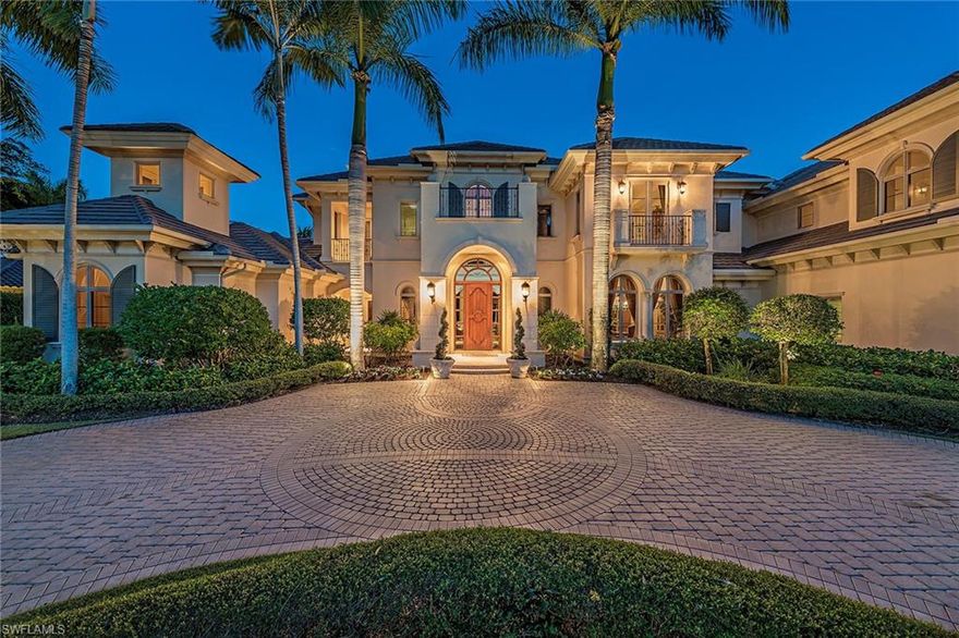 Nothing has been overlooked in this magnificent estate overlooking a spectacular wide lake, golf and preserve view in the exclusive Estuary at Grey Oaks neighborhood. The over 9,500-square-foot, five-bedroom, seven-and-two-half-bath home includes a plush media room, maple wood paneled library and second floor 16x28 bonus room. The living room features a soaring ceiling, gas stone fireplace and overlooks the infinity-edge, multi-level resort-style pool with 360-degree spillover spa. A picture window connects an intimate dine-in climate controlled 1,000-bottle wine room and a relaxing cigar/pub room including separate ventilation system perfect for entertaining friends and family.  The kitchen includes a Wolf/SubZero appliance package, marble and granite countertops overlooking the family room and spacious outdoor living with automated screens, summer kitchen, bar and gas fireplace. Additional features include dual master baths, an attached four-car garage, Argentinian stone flooring, detailed moldings and a Control4 home automation system.