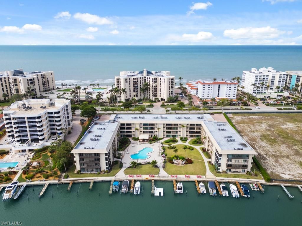Photo of 3200 Gulf Shore BLVD N #407, NAPLES, FL 34103 (MLS # 225080193)
