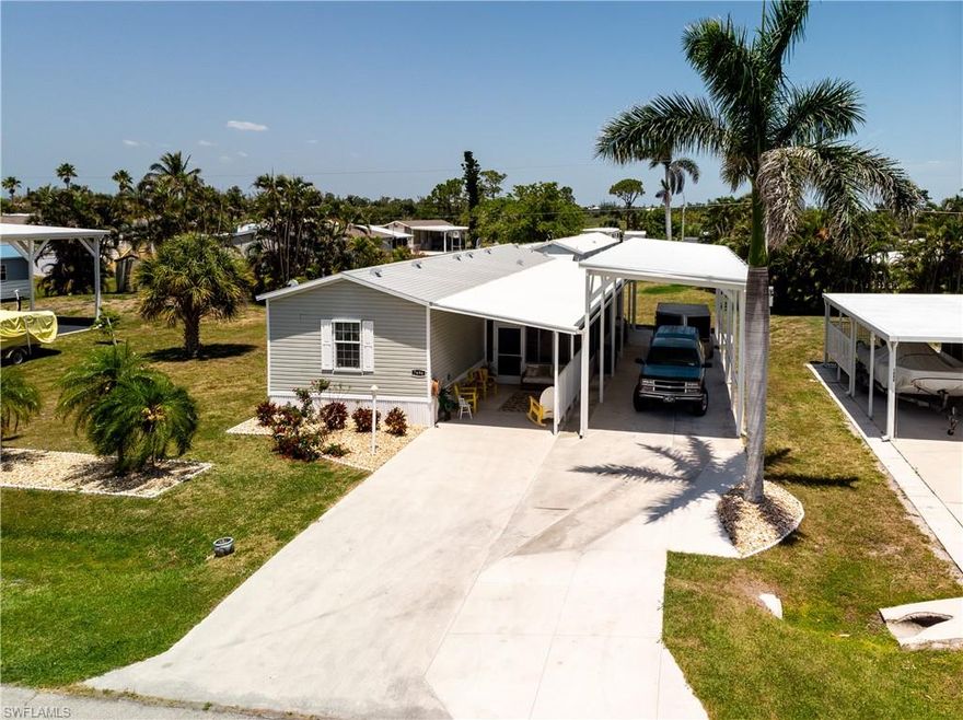 Nicely furnished home in a very quiet area of Pine Island. Being sold Turnkey. Newly installed Hurricane rated carport that's 60' feet long and 14' high. It has power and lights. The interior is a 2/2 with new carpet in the bedrooms. Nice large storage area off the porch. Porch has full shades, and operating windows and an AC unit. Close to marinas and restaurants.