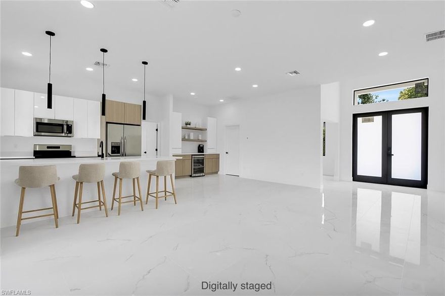 Beautiful Brand New Construction – Modern Farmhouse in West Florida!
Discover this stunning new build in one of the fastest-growing counties in West Florida. This home features a bright, open floor plan with impressive 10-foot ceilings throughout, creating a spacious and airy feel.
The home offers 3 bedrooms, 2 full bathrooms, and a versatile den that’s perfect for an office, playroom, or guest room. You’ll also enjoy the convenience of an independent laundry room, a spacious 2-car garage, and a covered lanai ideal for relaxing or entertaining. There’s plenty of backyard space to add a pool if you’d like to enjoy outdoor leisure and family fun.
Designed in a modern farmhouse style, the exterior showcases beautiful shiplap-inspired stucco details. Inside, elegant Santorini porcelain tile flows throughout the home in neutral tones accented by pops of black and natural wood, giving it a timeless and sophisticated feel.
Ideally located just 35 minutes from Downtown Fort Myers, 45 minutes from Downtown Cape Coral, and approximately 90 minutes from Sanibel Island and the area’s beautiful beaches.
This is the perfect home for anyone seeking a modern, low-maintenance lifestyle in a rapidly growing area!