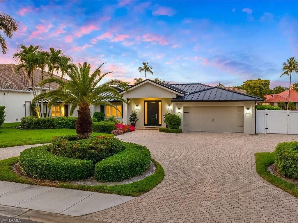 Photo of 337 Mooring Line DR, NAPLES, FL 34102 (MLS # 226016506)