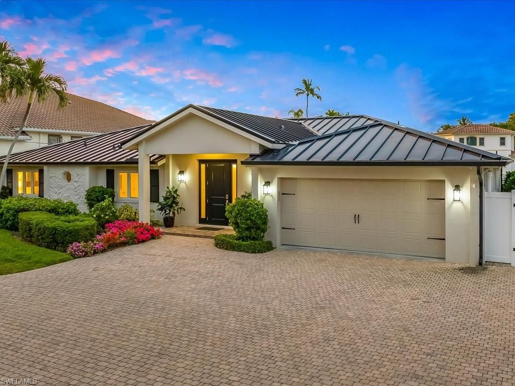 Photo of 337 Mooring Line DR, NAPLES, FL 34102 (MLS # 226016506)