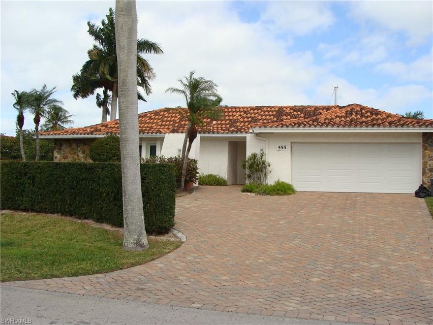 Wonderful waterfront home with direct gulf access. Boat dock in your backyard. Nestled amongst $7 and $8 million dollar new homes. Dead end, royal palm lined avenue. Walking distance to beach, 3rd St farmers market, and restaurants. High elevation home with newer impact windows and roof.