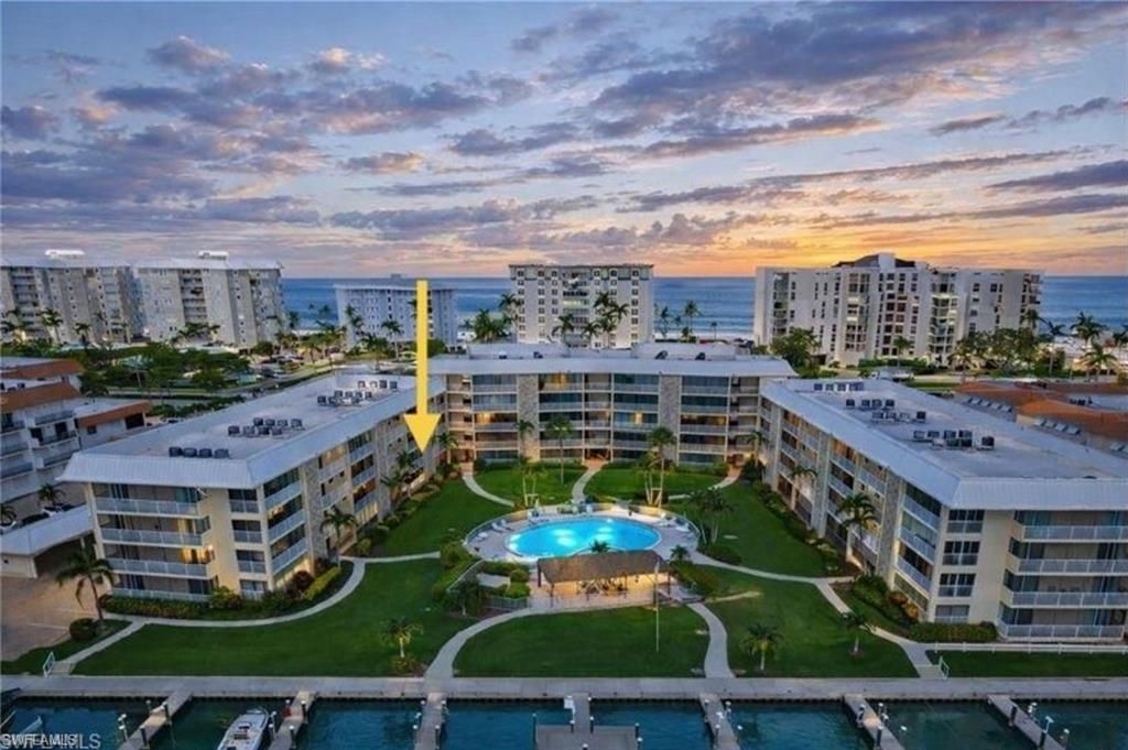 Photo of 3000 Gulf Shore BLVD N #212, NAPLES, FL 34103 (MLS # 226005017)