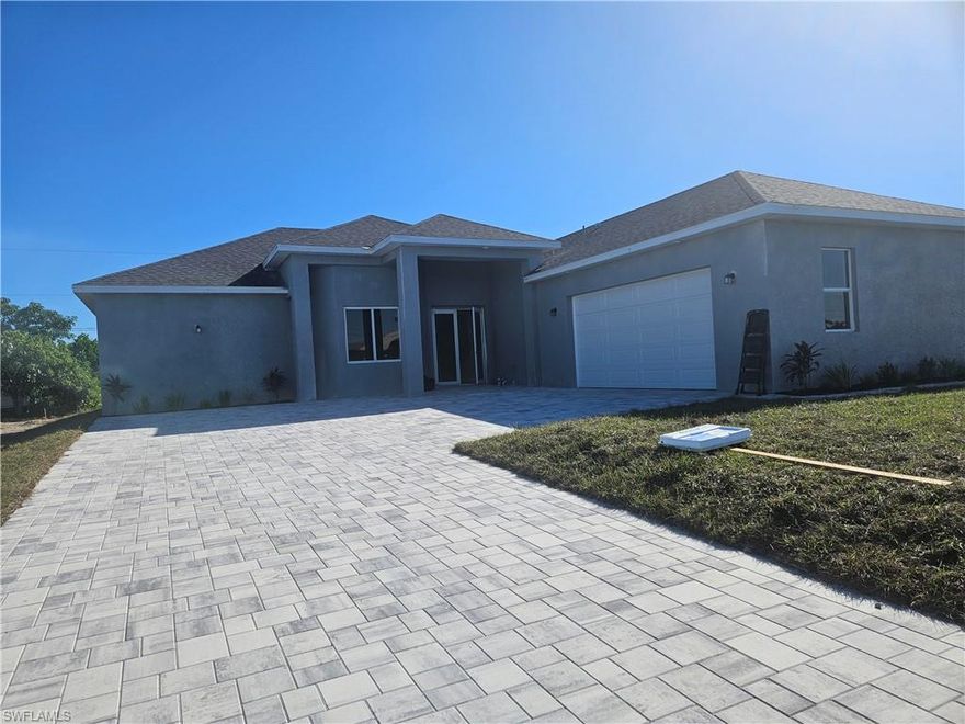 Welcome to this beautiful Cape Coral gem! This stunning 3-bedroom, 2.5-bath home offers the perfect blend of comfort, style, and convenience in one of Cape Coral’s most desirable and tranquil neighborhoods. Step inside to an inviting split-bedroom floor plan that provides privacy and functionality for the whole family. The heart of the home features granite countertops, all-new stainless steel appliances, and generous cabinetry—ideal for both everyday living and entertaining. Enjoy a bright, spacious living area with room to unwind, host, and make memories. High-end finishing. The home also features a two-car garage, providing plenty of storage and convenience. Relax outdoors on the large paved lanai, perfect for morning coffee, family gatherings, or quiet evenings in the fresh Florida breeze. 
Located in a peaceful area close to great schools, shopping, the City of Cape Coral, and just minutes to Fort Myers, this home truly has it all—location, beauty, and modern comfort.
Move-in ready and waiting for you to call it home. Don’t miss your chance to make it yours!