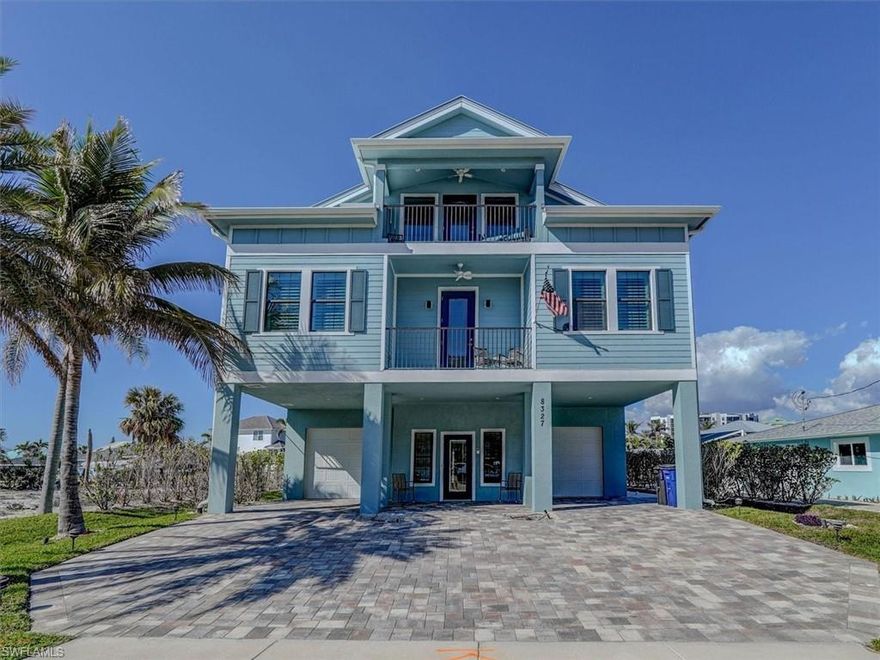 Now is the time! This three story beach house w/ elevator, built in 2018 by Emerald homes awaits your arrival. This coastal inspired home offers 4 bedroom with den / 3 full baths, pool & spa. Beautifully appointed and sold turnkey. Located on the quiet southern end of Fort Myers Beach,  the white sandy beach is just across the street and quick boating access to the Gulf of American and Estero Bay. Great room concept on the first living floor with large island for entertaining. A balcony off the dining area with auto-Storm Screen to shield wind and a multitude of windows bring in the Florida sunshine! The 2nd floor has one bedroom offering en-suite full bath and 2 other bedrooms share an additional full bath. The 3rd floor is an Owners dream with spacious bedroom & seating area with private balcony to catch all of the morning sunrises with a flex option of a home office/den or additional sleeping quarters with another balcony towards the Gulf of America for those amazing sunset views. Heated Pool & Spa with boat dock with 15K lift (accommodates up to a 32 ft. vessel) complete the package, everything you need for a full time or part time oasis. Don't like the stairs, no worries home also offers an elevator! This home resides in the Weekly Rental district offering maximum rental potential. Located on the southern end of the island with quick access to Lovers Key State Park, Bonita Springs & Naples.