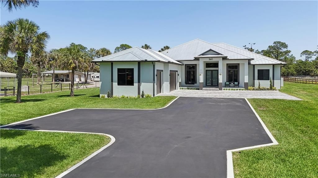 Photo of 360 13th ST SW, NAPLES, FL 34117 (MLS # 226015981)