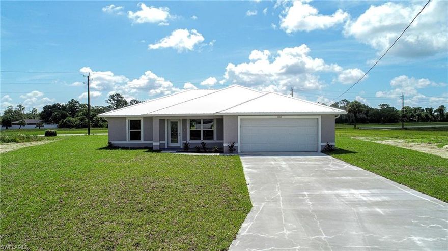 You Will Be Amazed By The Quality Of This Brand New Construction (Blue Line Homes) 3 Bedroom/2 Bathroom/2 Car Garage Home Located In Port LaBelle. This Home Is MOVE-IN READY Today! The Island Kitchen Comes With New Granite Countertops, NEW STAINLESS STEEL KITCHEN APPLIANCE PACKAGE, Real White Wood Shaker Cabinets With SOFT TOUCH Closing Doors & Drawers, Tile Backsplash, And Stainless Steel Sink. Other Upgrades Include; Metal Roof, Solid CBS (Block) Construction, Spray Foam Insulation In the Ceilings (30+ R Factor), HURRICANE IMPACT WINDOWS (No Need For Shutters!) New Laminate Flooring Throughout The Entire Home, Upgraded Baseboards, Custom Lighting/Ceiling Fan Package In Every Room, Large Dining Area, New Custom Interior/Exterior Two Tone Paint, A Large Walk-In Closet In The Master Bedroom, Granite Countertops With Sinks With Brushed Nickel Fixtures In Both Bathrooms, Real Tile Showers, Landscaping Package, An Oversized 2 Car Garage, Open Covered Lanai, Termite Stations Outside, And An Oversized Laundry Room That Is Inside The Home! This Home Is On Central Water And Comes With A TANKLESS WATER HEATER! Easy Access To Shopping, Schools, River, Boating, Airport, And Restaurants!