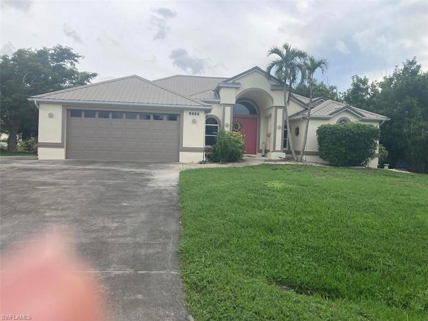 Come view this lovely one level  home overlooking a lake. This home has a full size pool and large patio.. Metal roof- no damage from hurricanes.  It sits on a quiet road in Bokeelia close to all conveniences - groceries, restaurants, library.  Open floor plan - you walk in and look right to the lake with a large patio area.  Master bedroom looks to the pool with shower and bath-walk-in closet.  The kitchen is in the heart of the house.  Two other bedrooms one used as office now.
Two car garage with small work area.  Close to the best fishing on Pine island.