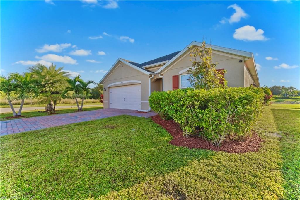 Photo of 10285 Silver Pond LN, LEHIGH ACRES, FL 33936 (MLS # 2025018297)