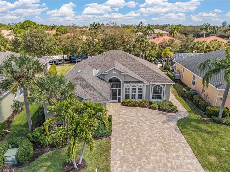 Loved and well-maintained LENNAR built 3/2/2 home on GULF ACCESS canal, with private DOCK, covered 10000 lb LIFT and NOT IN FLOOD ZONE! This home is a boater's paradise and great for entertaining. Step inside into an open light filled space that has been thoughtfully designed and styled. High 10-foot ceilings, crown molding, upgraded light fixtures and fans, updated main and guest bathrooms, plank tile in main areas, neutral paint colors, cellular blinds on all sliders. With a formal dining area, breakfast nook, open concept living area, hosts can always be part of the conversation and entertain with ease. Open the set of oversized sliders and extend your living room to the outdoors! Take your party down to the dock with a sitting area and watch boats go by, or take everyone for a cruise from the convenience of your own dock and lift. It is about 20 min to the river, 50-55 to the gulf. Bright and open home, with ample storage inside and in the garage. Plenty of room for a pool. Roof is 2018, AC 2015, water heater is 2023, 2024 generator plug with by-pass, 2018 kitchen appliances and washer/dryer. Security system, remotely operated thermostat, solar operated vent in the attic are just some of the extra features on this home. Home comes with accordion storm shutters and storm glass on the front door. Amenities include clubhouse, heated pool, hot tub, tennis court, boat ramp/docks. Palm Island is a gated community, with resort style amenities, minutes to downtown Ft Myers and everything it has to offer. No CDD, county taxes only, no flood insurance required, LOW HOA fee of $285/mo covers yard maintenance, exterior pest control, mulching, edging, trimming and access to the amenities. About 30-40 min to RSW or PGD airport. Schedule your showing today and make Palm Island your permanent home or a winter escape!