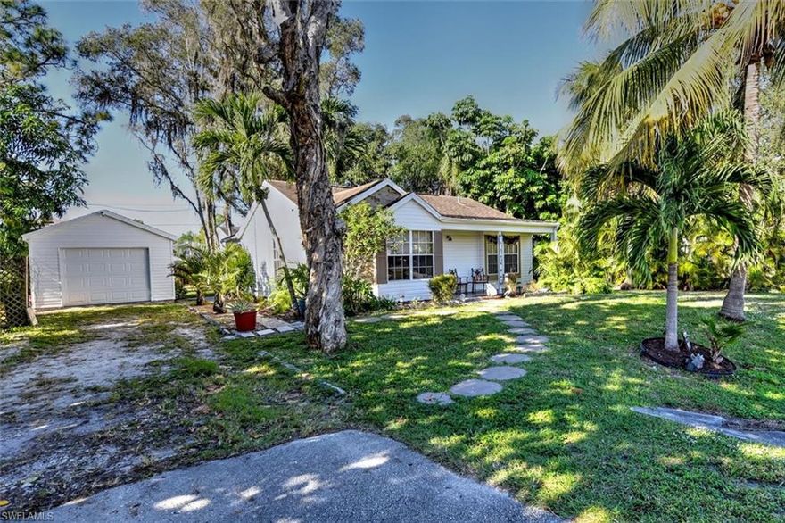 Adorable 2 Bedroom Home in the heart of San Carlos Park.  No HOA fees or restrictions. This home has been almost completely renovated including new vinyl siding on the exterior with new pressure treated wood underneath, new front door, new slider in the master bedroom, new water system, all new flooring, new countertops, deep stainless sink and stainless steel appliances in the kitchen, all new light fixtures, and new tub and toilet in the bathroom. The home is situated on a large private lot with mature trees and features a screened lanai, a large pergola deck off of the master bedroom, and a side deck.  San Carlos Park is located in south Ft. Myers, just minutes from Bonita Beach, the airport, Coconut Pointe Mall and pretty much anything else you need!  This home is perfect for a single person or a retired couple.  It would also make a great Airbnb.