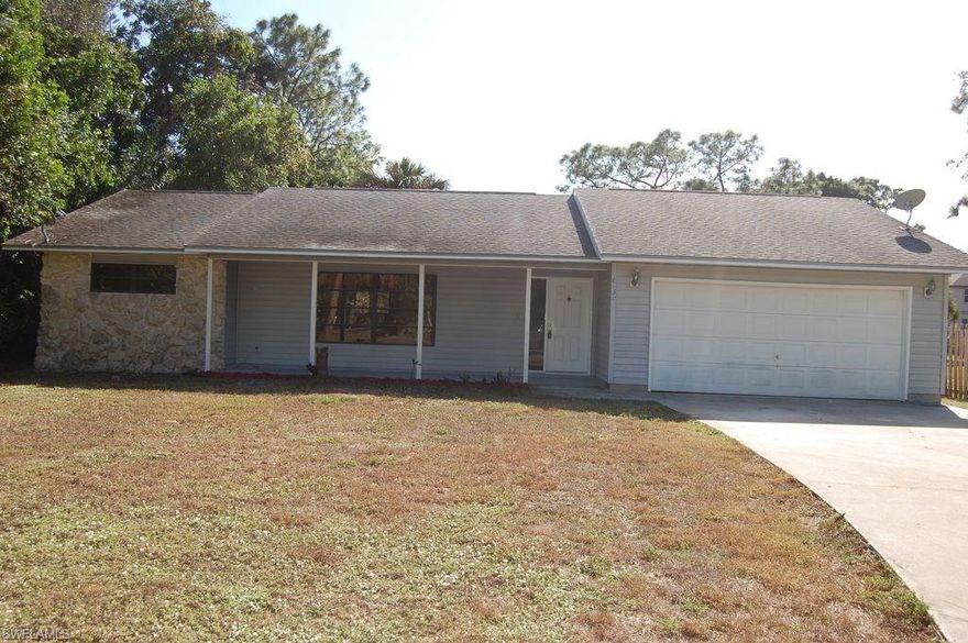 Great location with a large lot in Naples !  Incredible and rare opportunity for this 3 bedroom 2 bath home with two car garage WEST of Santa Barbara! This home features a split bedroom floor plan with a large living area, an open layout, ample cabinetry, a spacious living area, and a large master bedroom with attached bathroom.  Relax or entertain comfortably on the screened in porch providing plenty of outdoor seating space and beautiful views of the naturally landscaped yard. All tile & laminate, no carpet. Very private, country setting with LONG driveway on 1.14 acres. Newly screened lanai. Large front porch. Newer A/C & hot water heater all replaced in last few years. Close TO TOWN. *GULFVIEW MIDDLE AND NAPLES HS. Updated master bath, dual pedestal sinks, large tub & separate shower. New oven. Freshly painted. Desirable southern exposure. No HOA! Great value in this area.