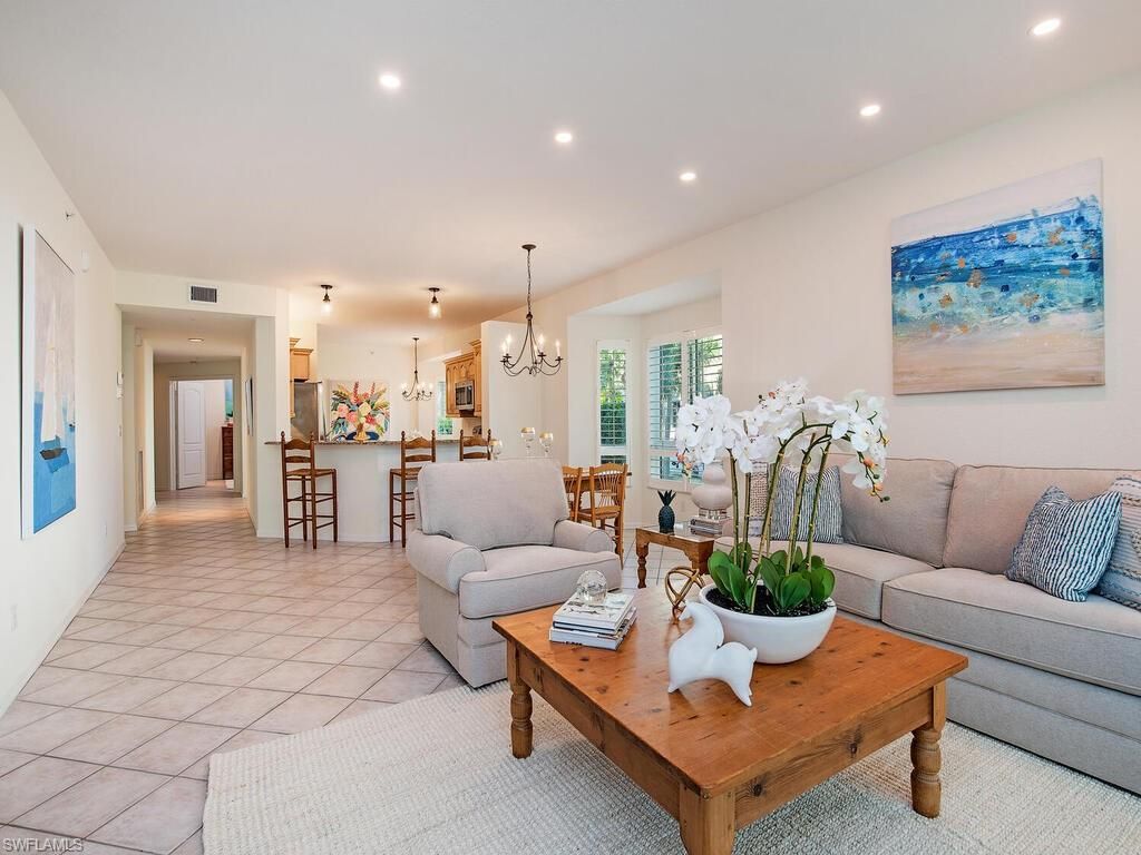 Photo of 7671 Pebble Creek CIR #101, NAPLES, FL 34108 (MLS # 225078416)