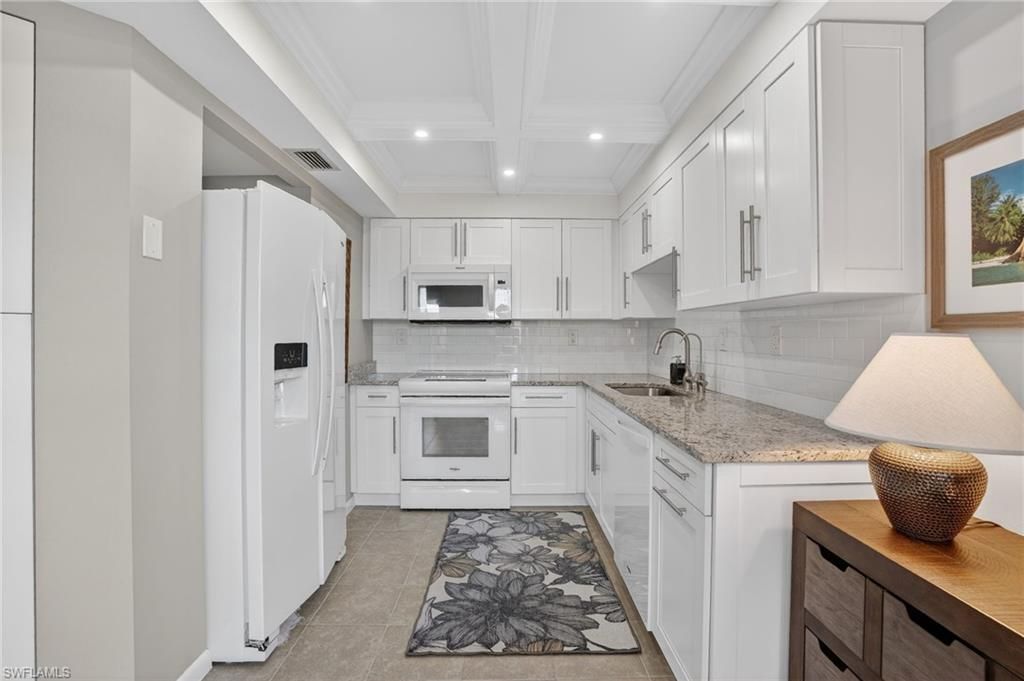 Photo of 1544 Mainsail DR #48C, NAPLES, FL 34114 (MLS # 225083632)