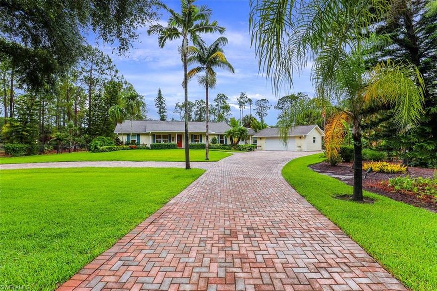 Welcome to Oakes Estates! This property appears to be a modest ranch from the lane, but holds one surprise after another. This is the perfect multigenerational home all on 2.27 acres. This property could be one large home or 2 individual residences. The original wing is 3 bedrooms 2 bathrooms, fully updated throughout with meticulous attention to detail. The second wing of the home is 2 bedroom 2 bathroom with a separate entrance and private deck. Both wings lead to the expansive pool deck area and 18’ x 28’ salt water pool. Across the seashell drive sits the barn housing a 2 plus garage and 416 sq ft AC workshop on the first floor. Upstairs is a 736 sq ft game/activity space with built in storage cabinets, perfect for an office space. This area can be accessed by either an interior staircase or exterior private entrance. The home is the perfect mix of character and modern amenities. Whole home reverse osmosis water system, impact doors and windows throughout, two electric access gates, paver driveway and fenced yard are some of the many upgrades this home offers. Oakes Estates is ideally located just minutes to I75 access, major stores and in top school zones in Collier County.