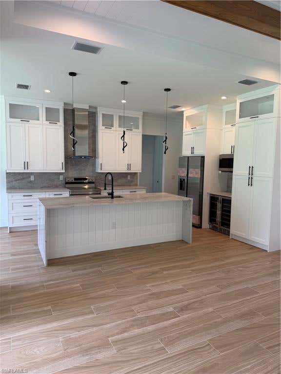 Photo of 2613 43rd AVE NE, NAPLES, FL 34120 (MLS # 226027622)