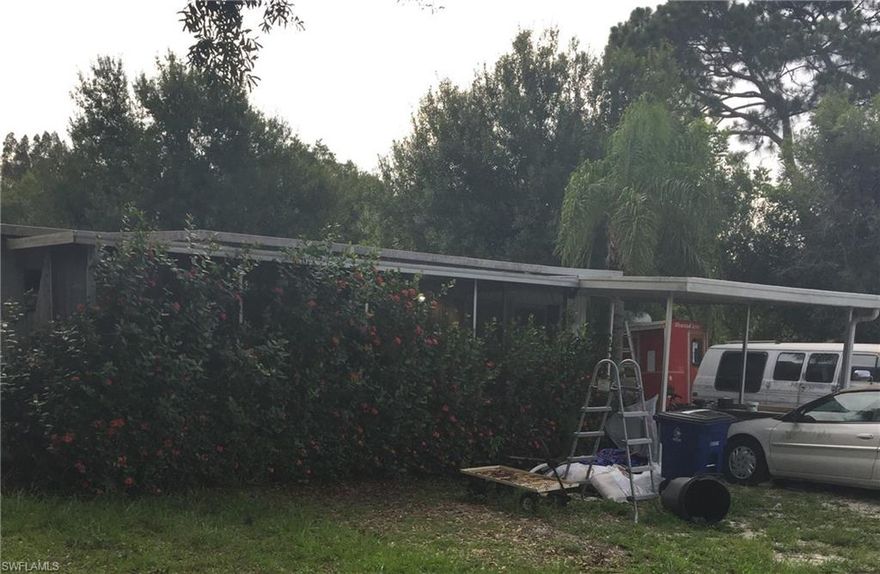 Investment opportunity. Two manufactured homes, 2/1 - 2/2, on large oversized lot almost an acre! Each is currently rented with long term tenants. Includes storage sheds and carports.