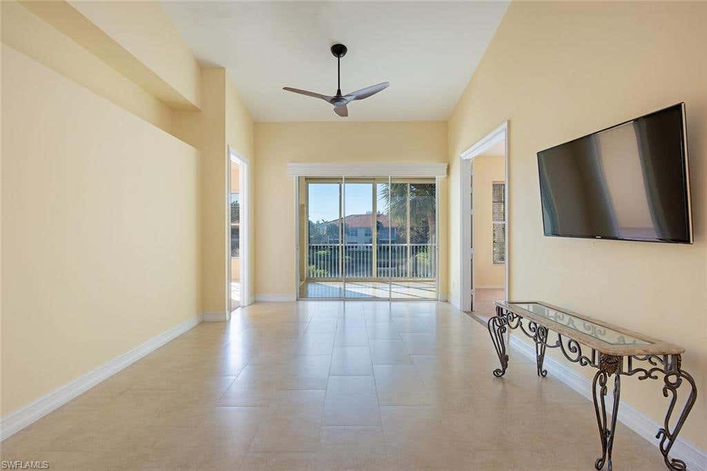 Photo of 1054 Egrets Walk CIR #203, NAPLES, FL 34108 (MLS # 224099509)
