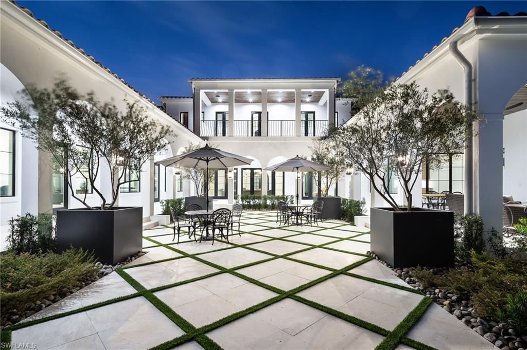 Photo of 50 Mahogany DR, NAPLES, FL 34108 (MLS # 225078315)