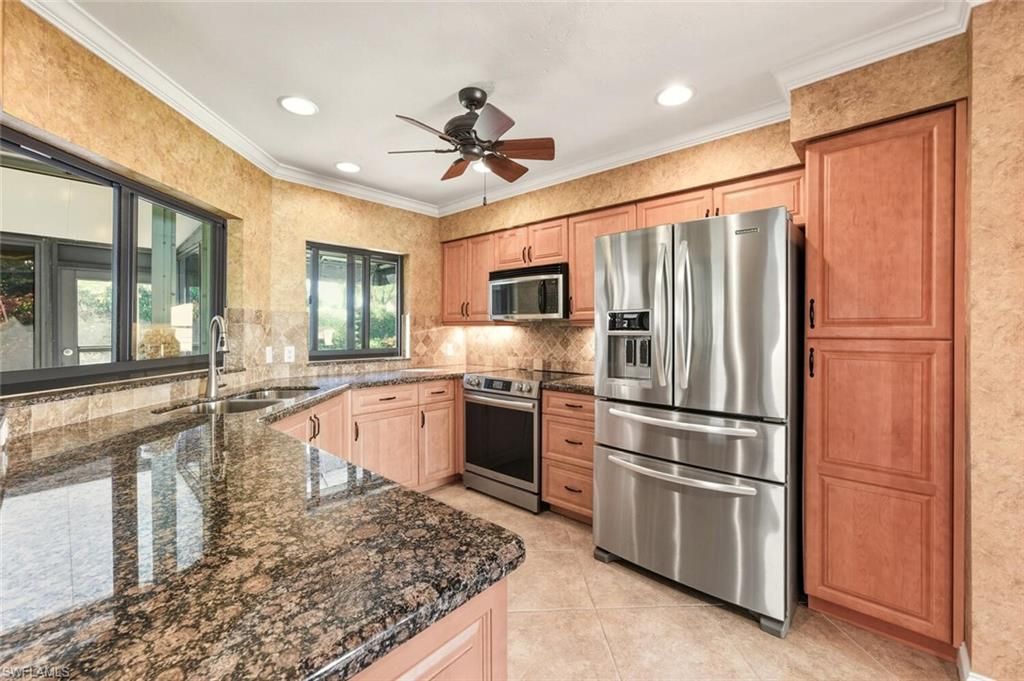 Photo of 738 Reef Point CIR, NAPLES, FL 34108 (MLS # 226007604)