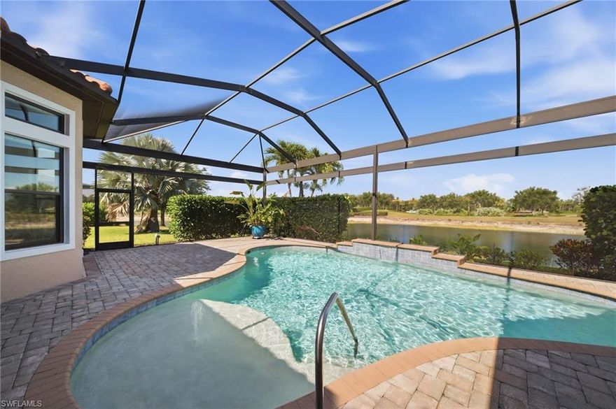 There’s truly a 'LOT' to love about this exceptional property!!  Discover refined luxury in this rare “Luca VIII” residence in Esplanade Golf & CC, offered with a coveted FULL GOLF MEMBERSHIP—an exceptional opportunity to enjoy one of Naples’ most prestigious resort-style communities.
Perfectly positioned on a premium, oversized LOT tucked within a quiet cul-de-sac and with neighbors on only one side—offering enhanced privacy and an exceptional homesite setting.  This residence offers remarkable privacy along with picturesque views of the water, golf course, preserve, and the elegant fountain-centered roundabout—creating a tranquil and truly grand backdrop. Step outside to an expansive screened lanai, thoughtfully designed for year-round enjoyment, featuring a pool, fireplace and a fully equipped outdoor summer kitchen—ideal for entertaining or relaxing in your own private oasis.
Inside, the home showcases a seamless open-concept floor plan enhanced by elegant 12 ft. tray ceilings, crown molding, surround sound ceiling speakers & diagonal tile flooring throughout the main living & dining areas, creating a refined yet inviting atmosphere. The chef-inspired kitchen offers a double oven, upgraded cabinetry, abundant storage, and a custom pantry, blending style with everyday functionality.
The spacious primary suite features power shades providing a serene retreat, flowing into a beautifully appointed spa-inspired bath with a recently renovated shower, and is complemented by a custom-designed California closet. Each guest bedroom is generously sized with its own en-suite bath, ensuring comfort and privacy for family & visitors alike, while a well-appointed den/office provides flexibility for work or leisure.
For ultimate peace of mind, the home is equipped with Storm Smart hurricane screens, hurricane impact windows/doors, and a whole-house generator, delivering protection and uninterrupted comfort in any season. The oversized garage offers ample space for two vehicles plus a golf cart and is enhanced with a radiant barrier reflecting heat back out of the attic and an A/C split system for year-round comfort.  Sellers recently replaced the water heater—just 3 years ago.
From the moment you arrive, it’s clear why the community earned the Outstanding Landscaping Award for its grand entrance from the National Association of Landscape Professionals.  Also, the lifestyle at Esplanade Golf & CC continues to elevate with a newly approved Capital Improvement Project (CIP) featuring four indoor pickleball courts, Bahama Bar enhancements, a redesigned golf course by Rees Jones, an expanded driving range, and an enlarged outdoor bar and kitchen at the clubhouse. Residents enjoy a true resort-style experience with championship golf, state-of-the-art clubhouse, poolside dining, cabanas, tennis, pickleball, scenic trails, dog park, fitness/wellness center, full-service spa/salon, and more—all ideally located in N. Naples near top shopping, dining, & airport.